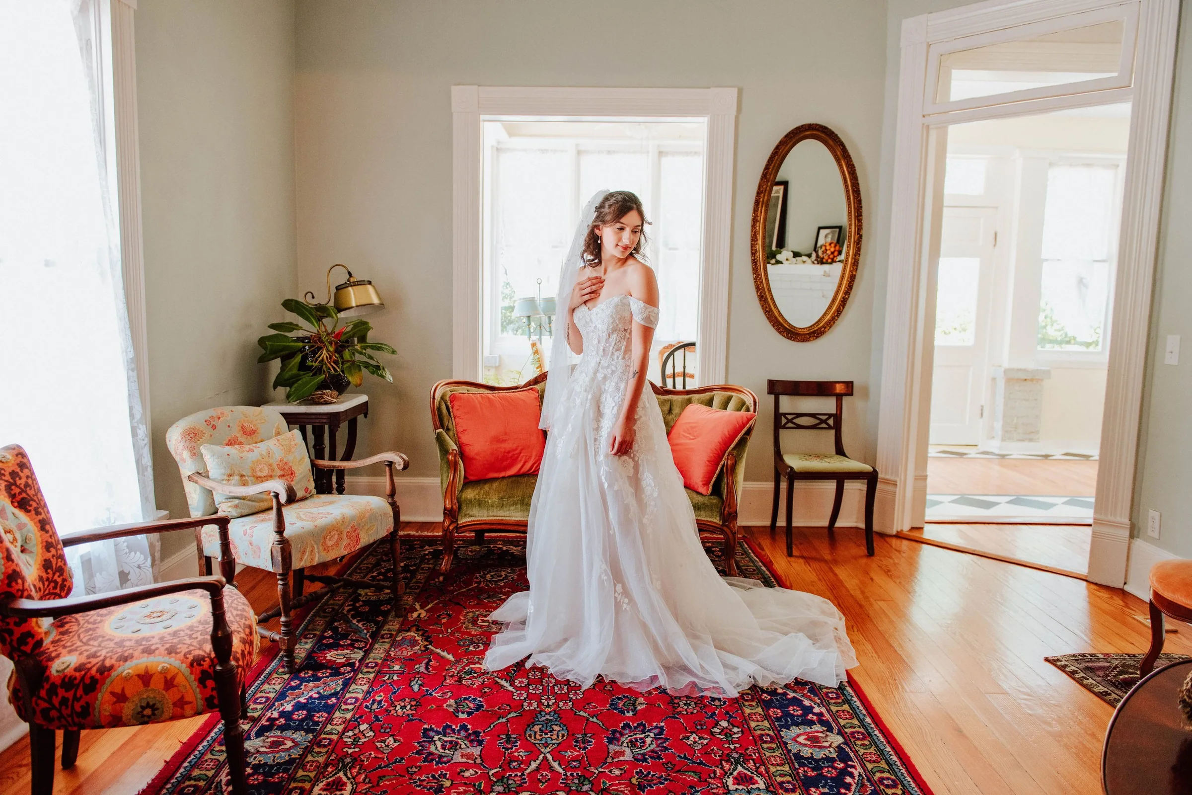 Bride standing in her wedding dress before the ceremony