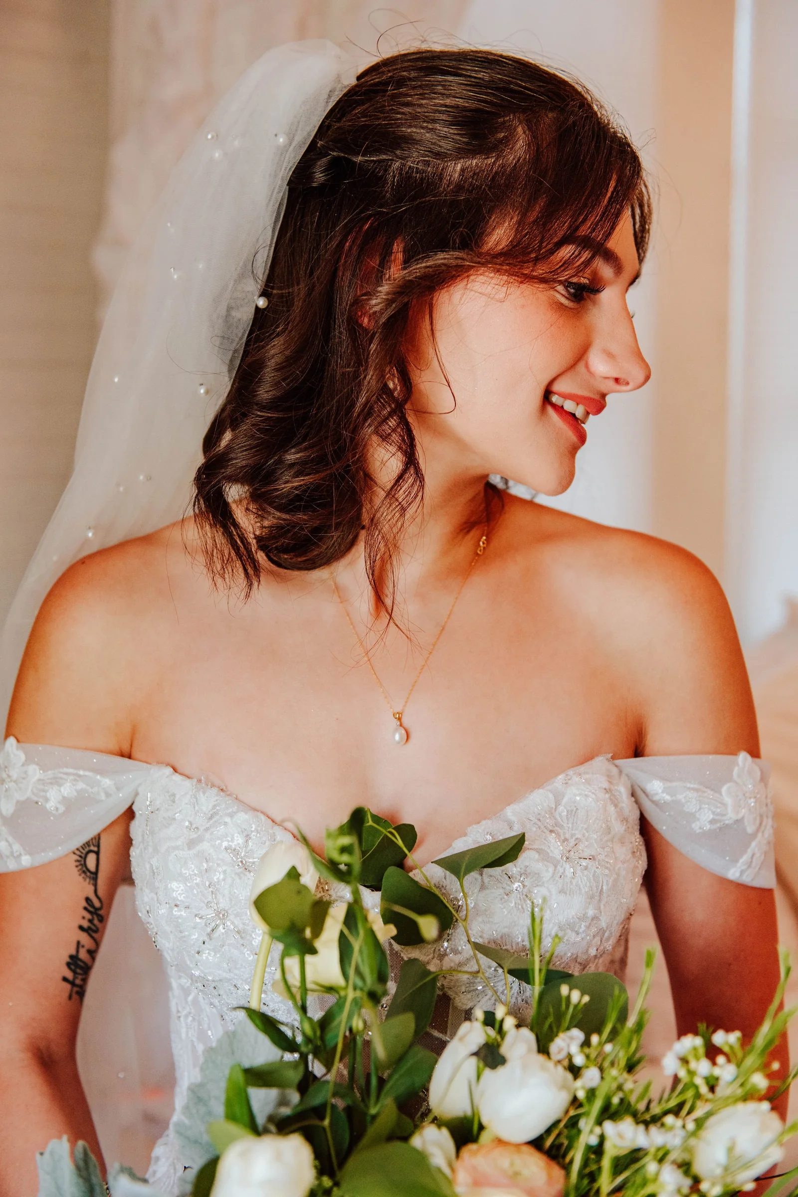 Bride with bouquet before walking down the aisle