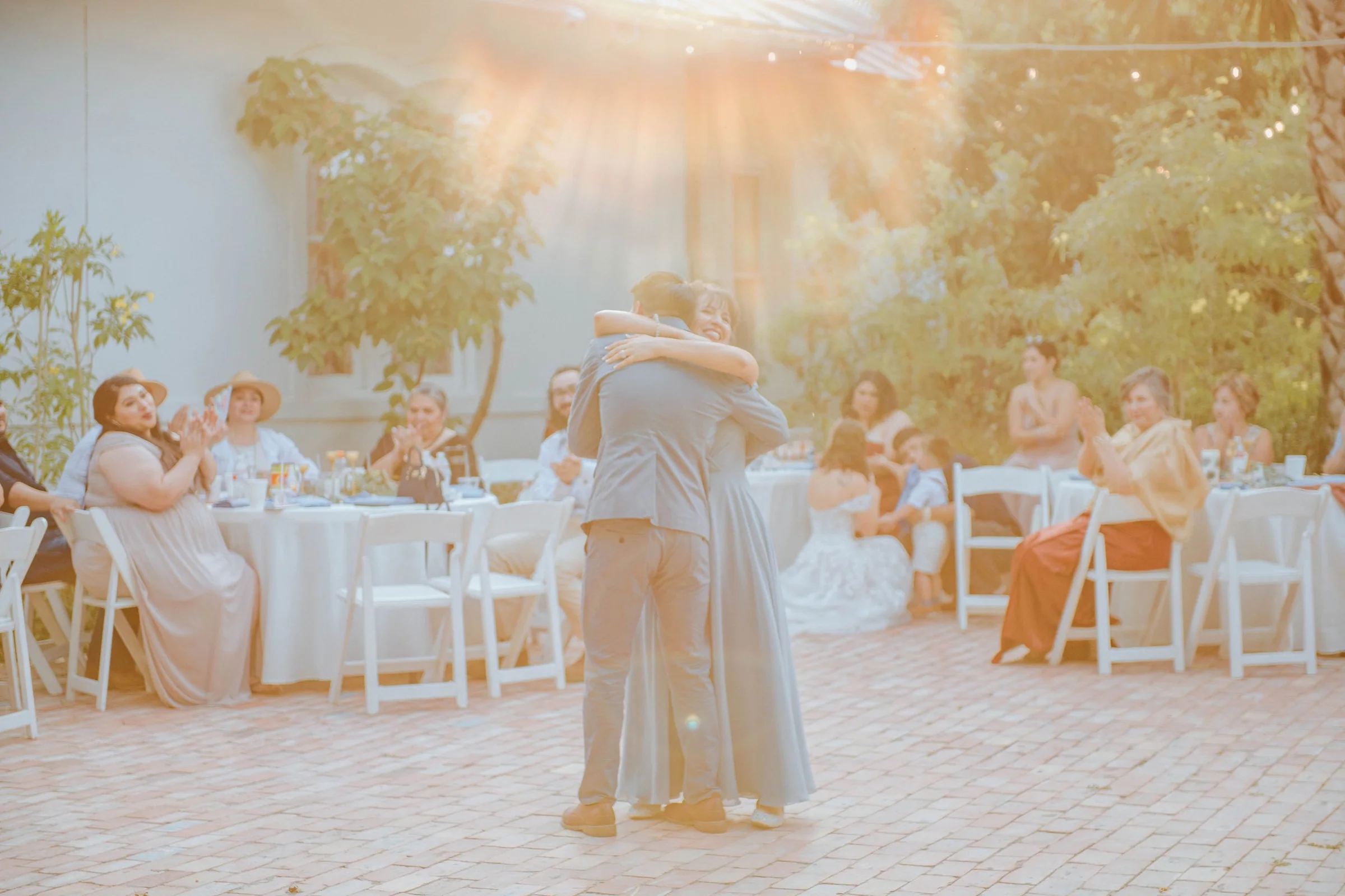 Outdoor ceremony scene in warm evening light